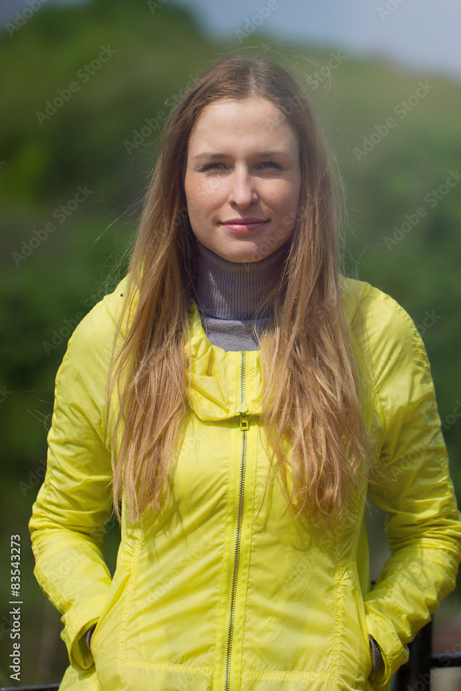 smiling girl against green park. smiling girl against green park.