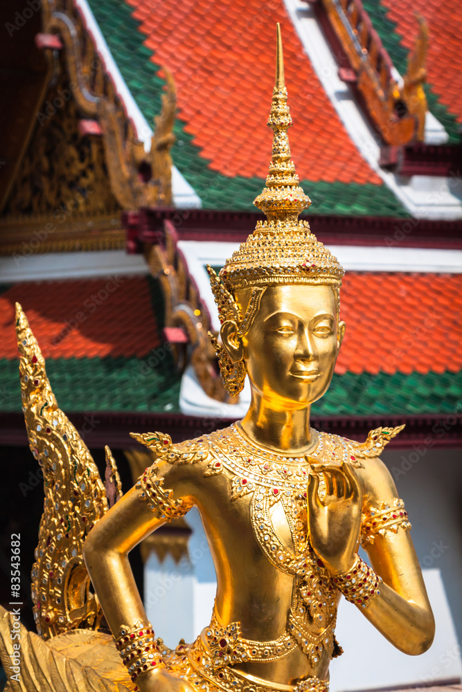 Golden Kinnari statue at Temple of Emerald Buddha (Wat Phra Kaew
