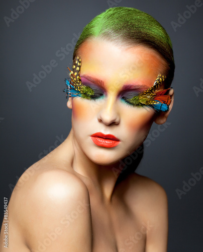 Woman with false feather eyelashes makeup