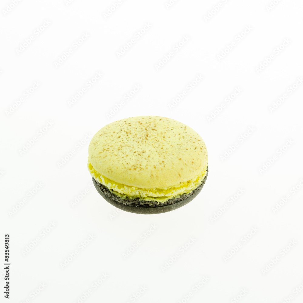 yellow and brown macaron on white background yellow and brown macaron on white background