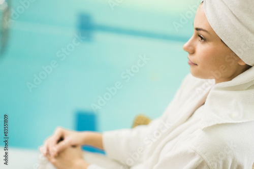 Young woman by the pool