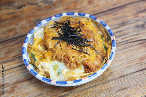 Katsudon deep fried pork cutlet with egg on rice photo