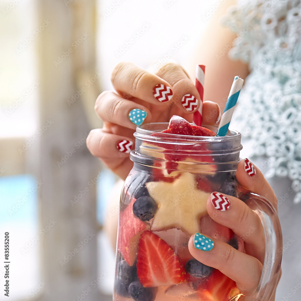 Fototapeta premium Cocktail with strawberry, blueberry and apple