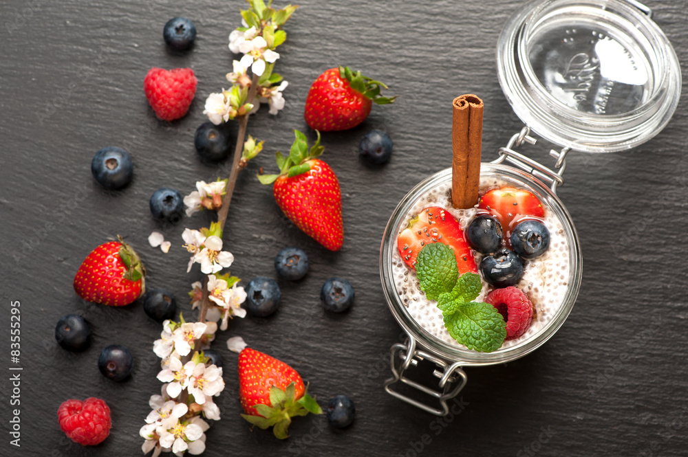 Chia seeds pudding with coconut milk and berries . top view Chia seeds pudding with coconut milk and berries . top view