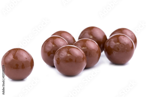 Chocolate candies on a white background. photo