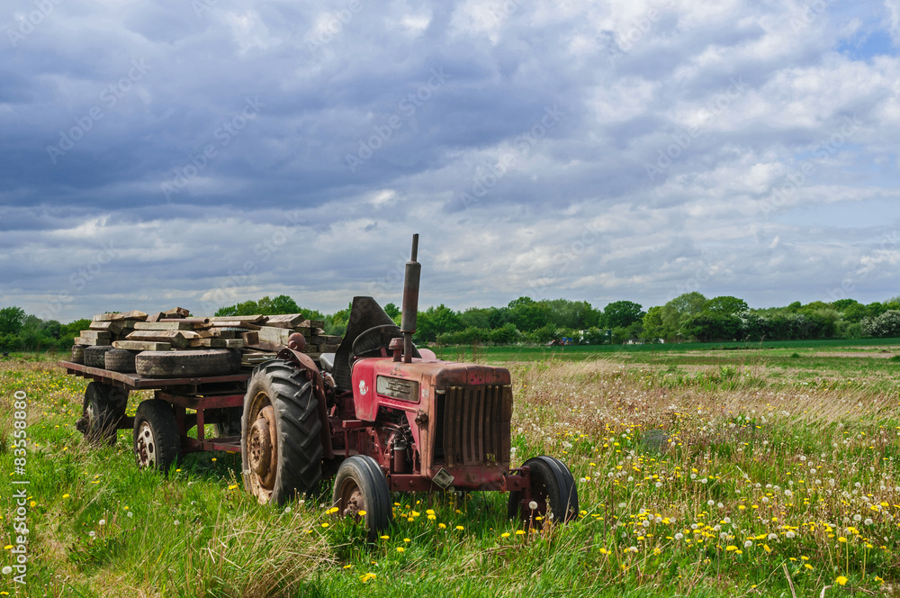 Abandoned Old Red Farm Tractor in Meadow Abandoned Old Red Farm Tractor in Meadow