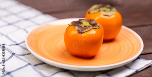 two persimmons