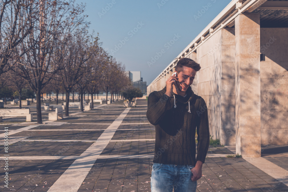 Fototapeta premium Young man posing in an urban context