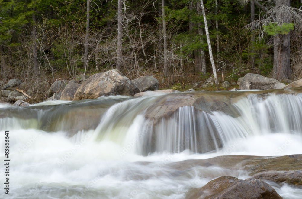 Fototapeta premium Water fall from river rocks