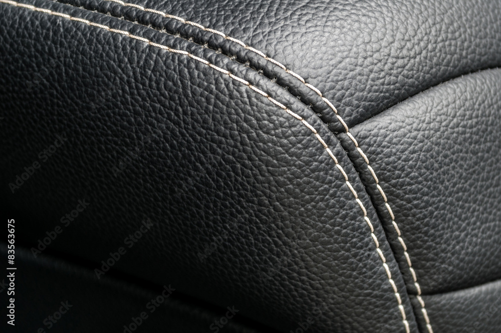 Modern business car interior detail. Leather background. Modern business car interior detail. Leather background.
