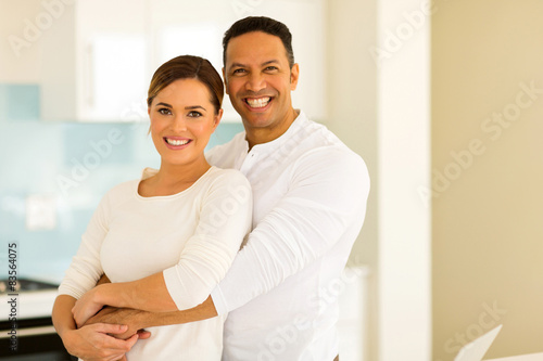 middle aged man hugging his wife