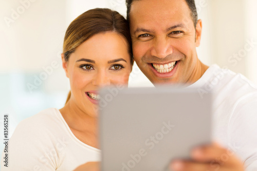 couple using tablet pc © michaeljung