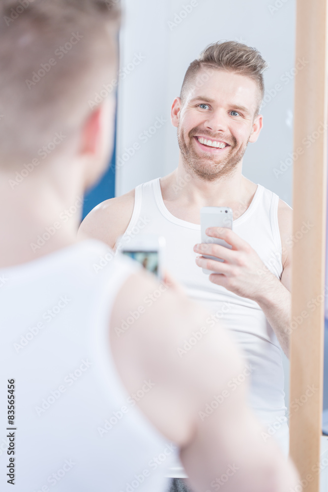 Taking a photo of himself