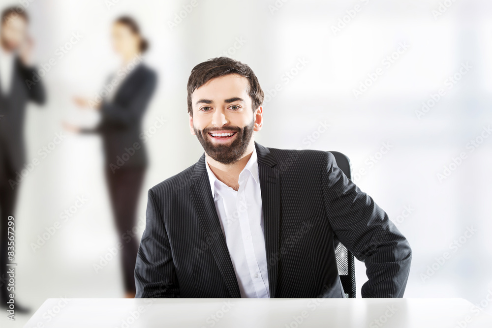 Smiling handsome businessman.