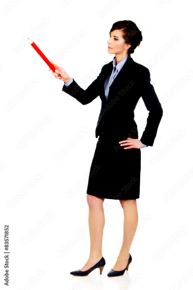Businesswoman pointing up with pencil. Businesswoman pointing up with pencil.