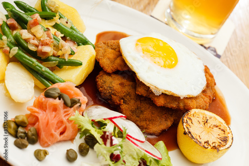 Wiener Schnitzel with Potatoes and Fresh Vegetables