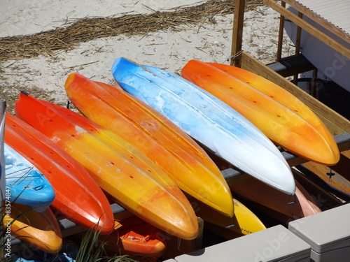 Bottom up kayaks lined in a row