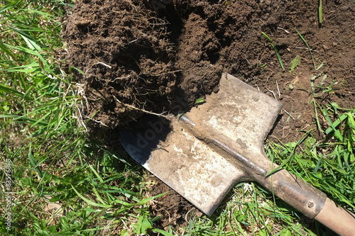 digging of the soil with a shovel