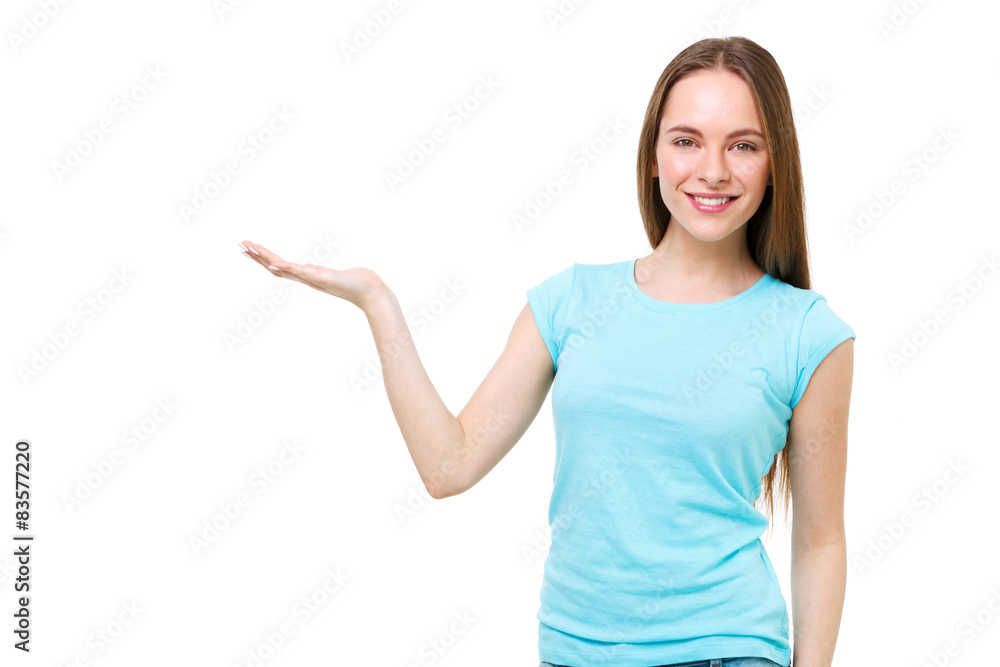 Young woman presenting something with open hand isolated on whit Young woman presenting something with open hand isolated on whit