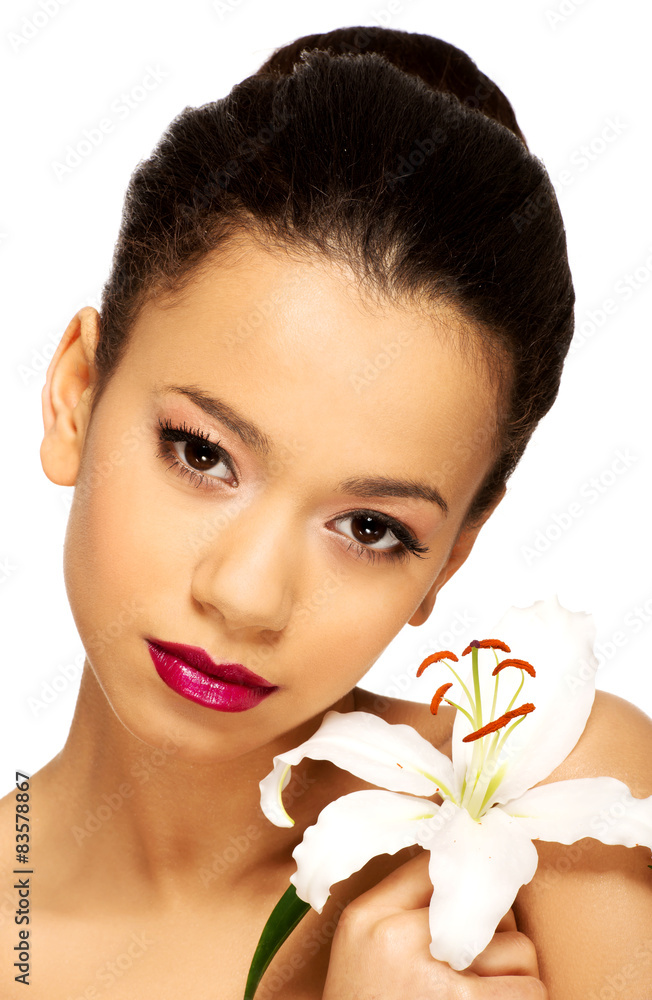 Beauty face of woman with lily flower. 