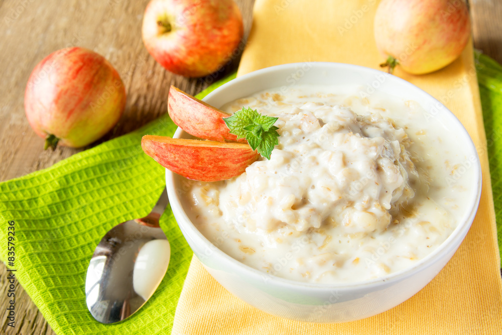 Oatmeal porridge with apple - obrazy, fototapety, plakaty 