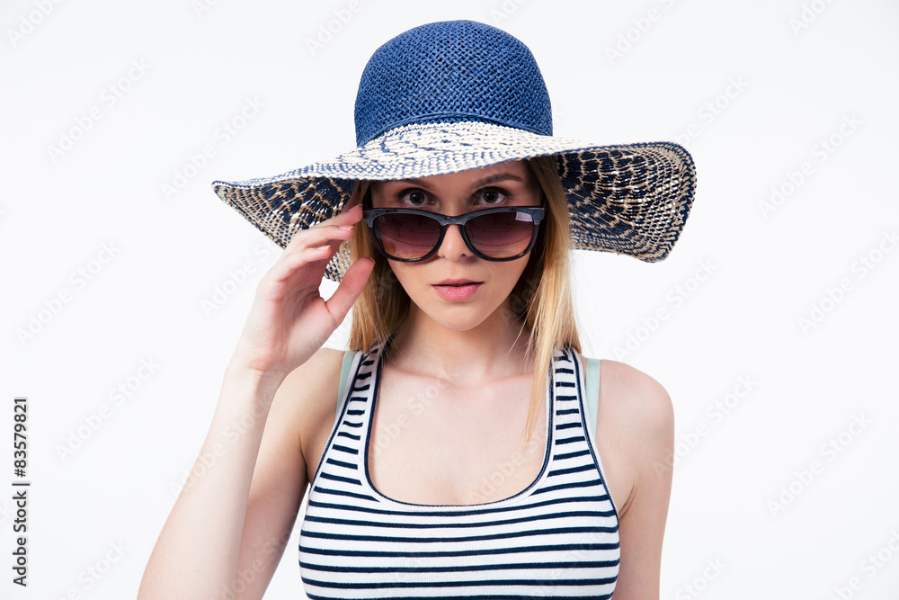 Trendy young woman in hat and sunglasses Trendy young woman in hat and sunglasses