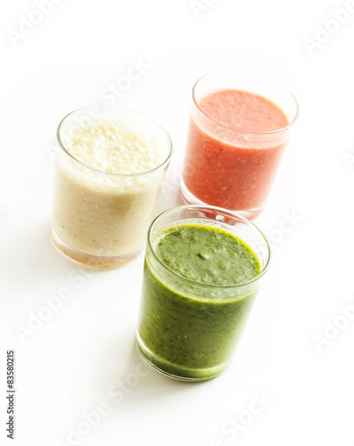 Glasses with smoothies isolated on white background