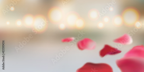 Unfocused blurred romantic background with rose petals.