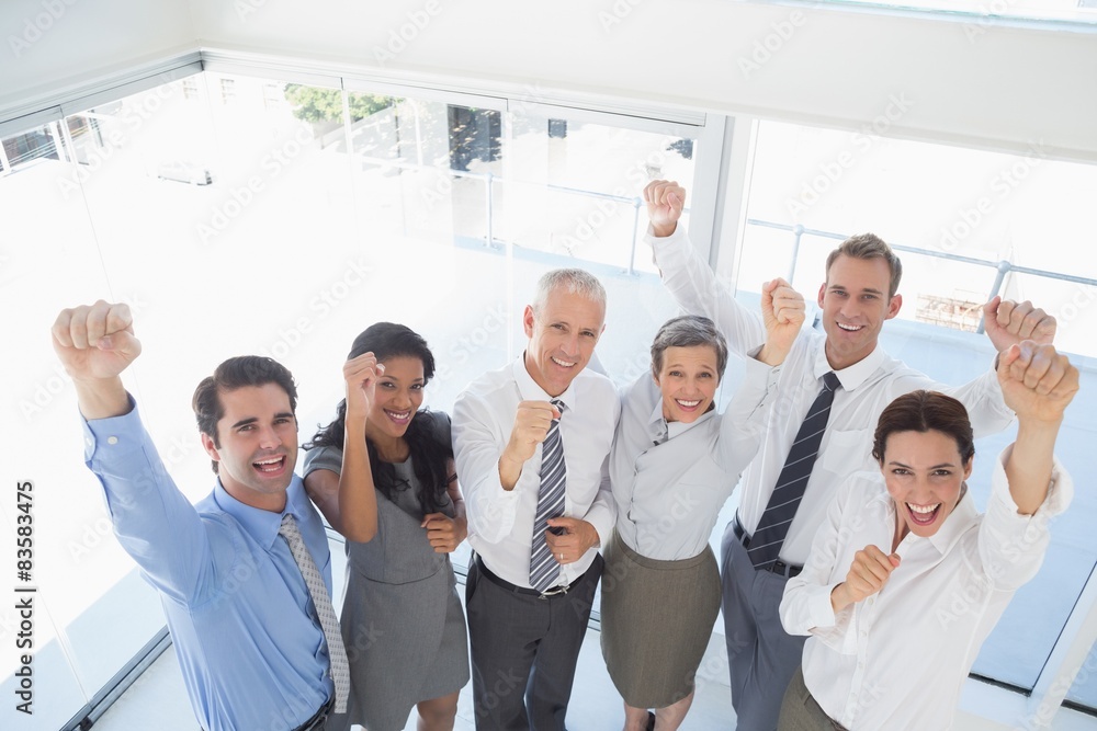 Business team celebrating a good job Business team celebrating a good job
