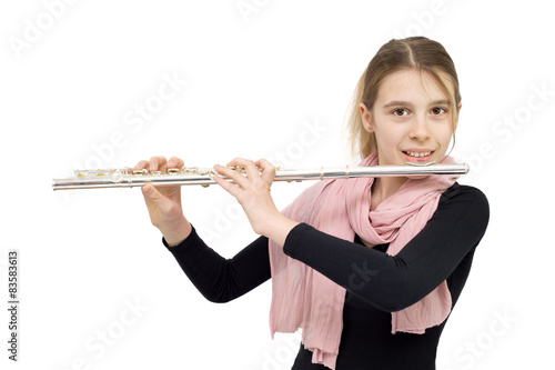 Young Flute Player Holding Flute and Smiling into the Camera