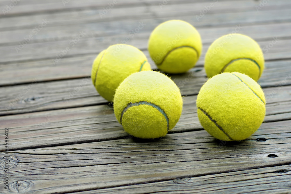 tennis ball  on wooden background