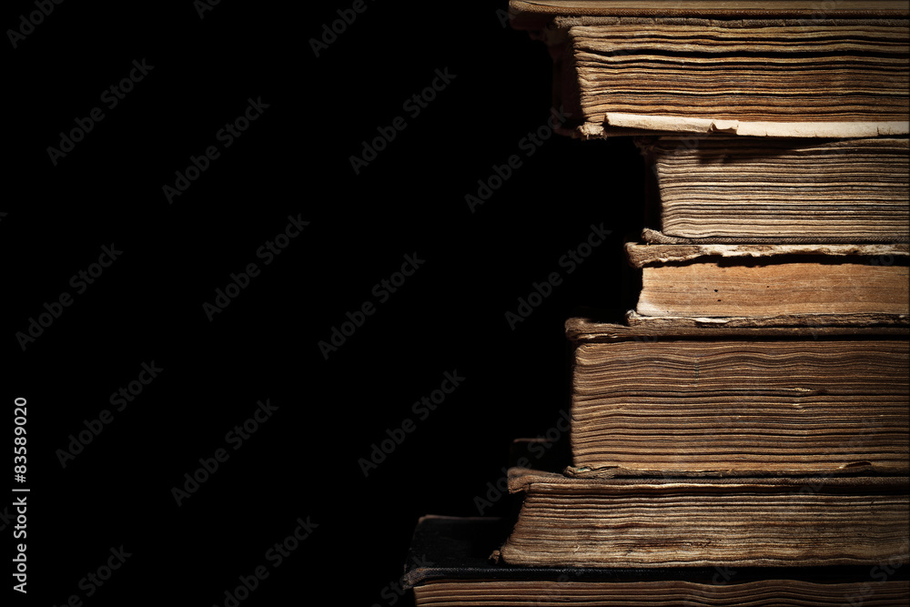 Naklejka premium Old books in a stack with a place for text