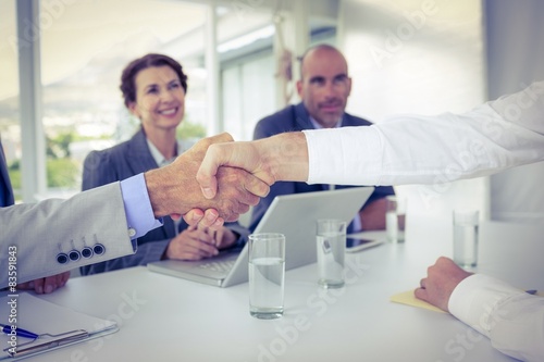 Business people shaking hands at interview