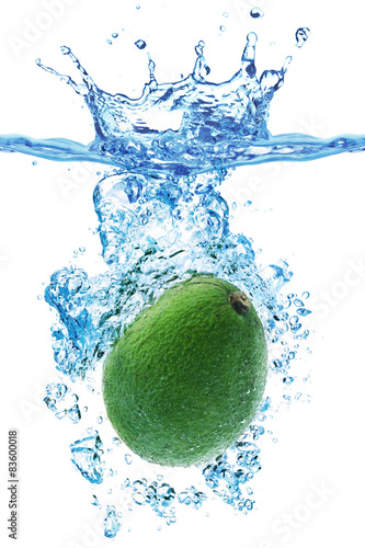 Avocado splashing in water