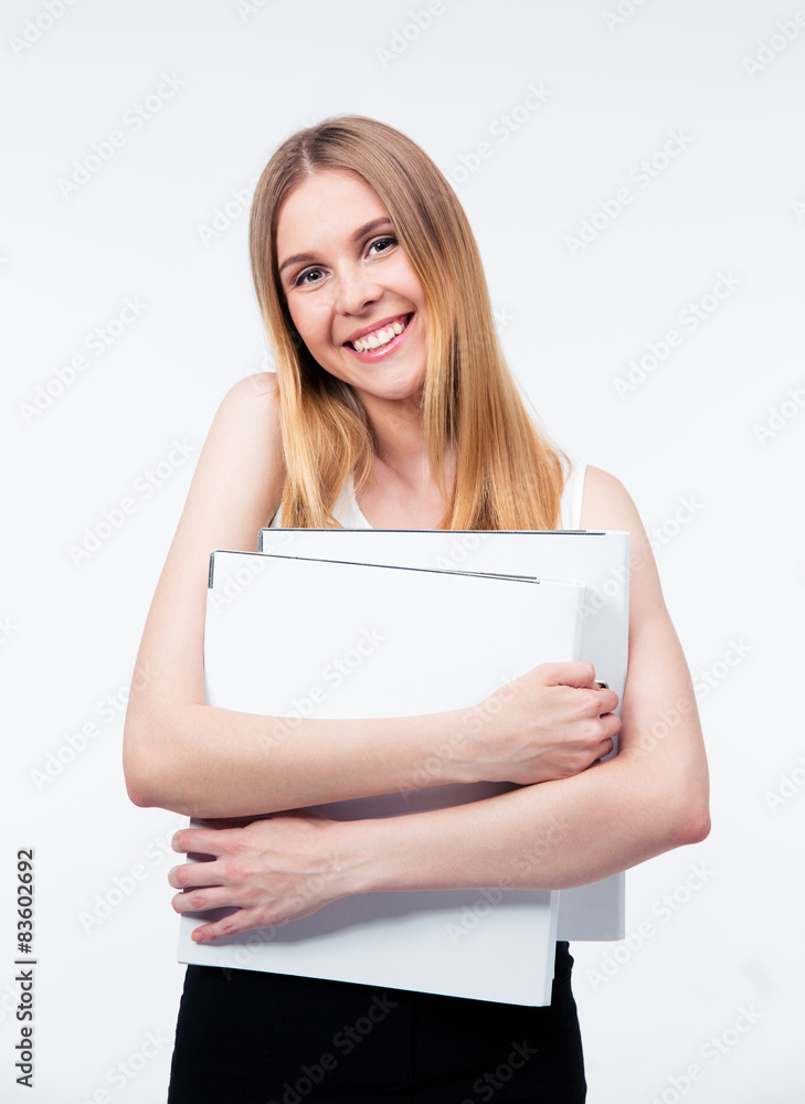 Cheerful young business woman holding folders Cheerful young business woman holding folders