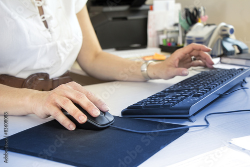 Business woman typing, Business woman working on computer in office