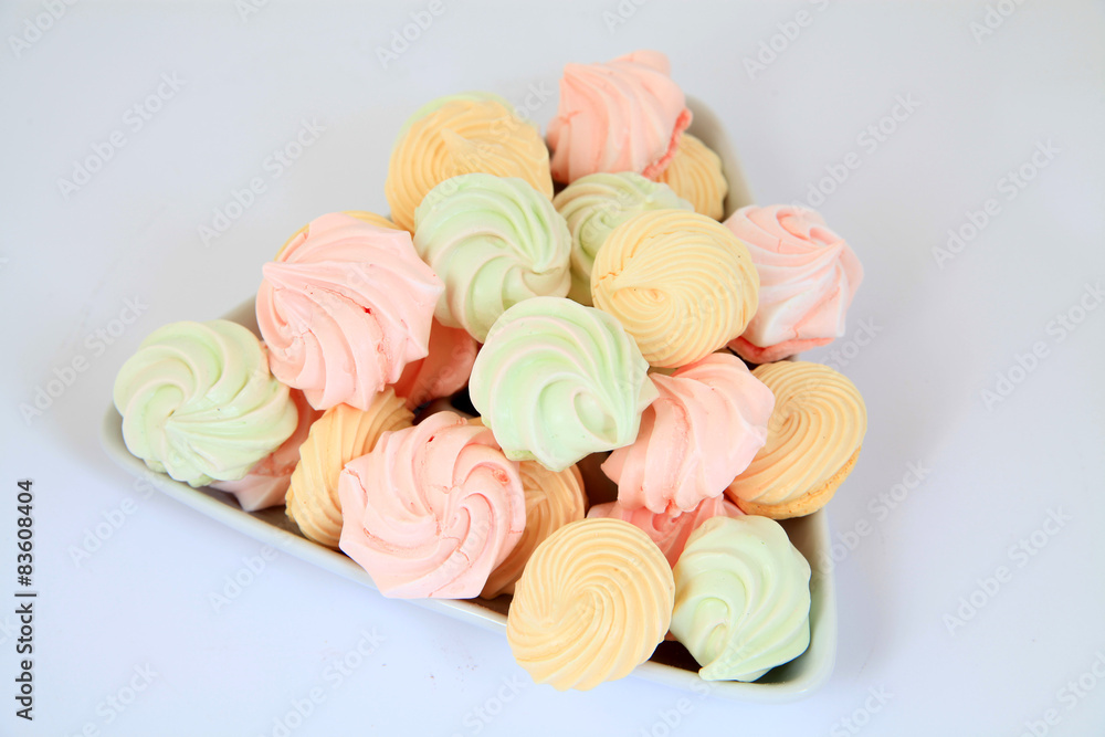 Party platter with colorful macaroons, kisses cookies Party platter with colorful macaroons, kisses cookies