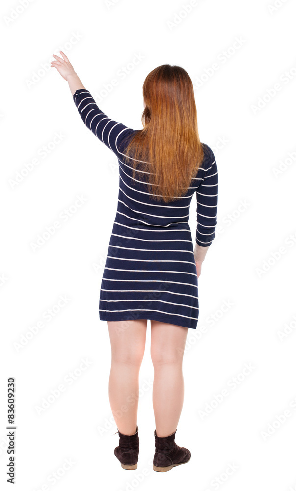 Back view of pointing woman Back view of pointing woman