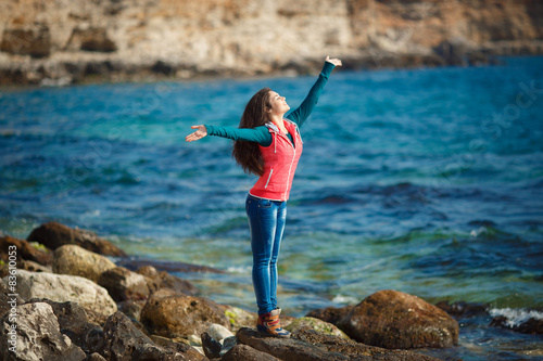 beautiful woman resting at sea photo