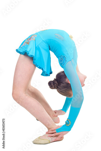 Cute young girl doing gymnastics