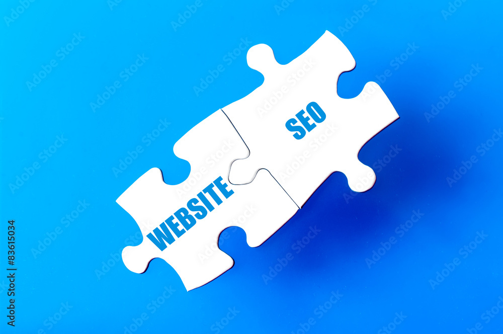Connected puzzle pieces with words WEBSITE and SEO Connected puzzle pieces with words WEBSITE and SEO