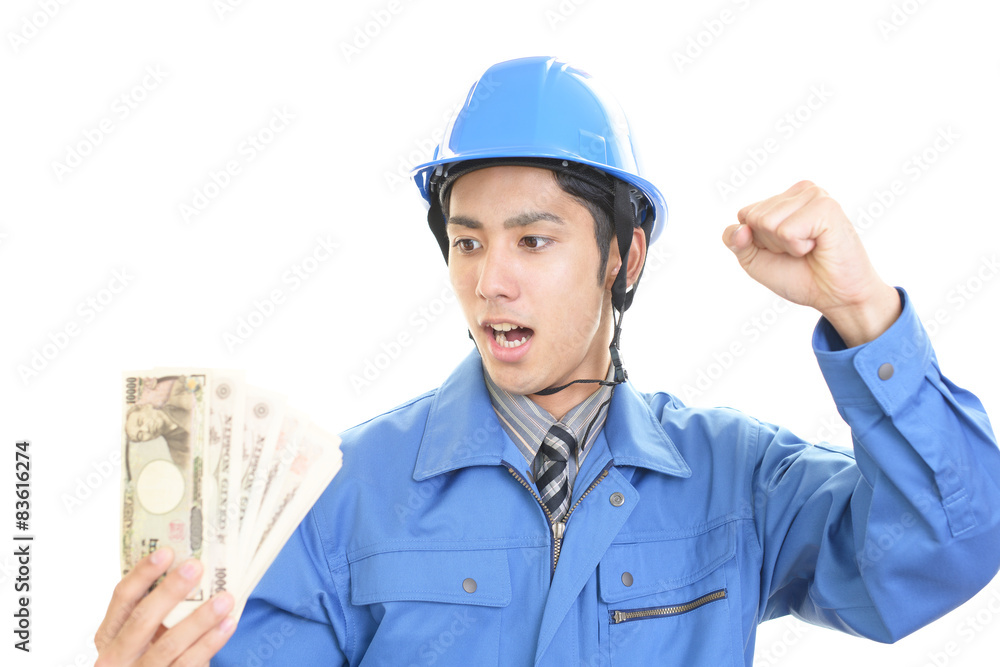 札束を持つ労働者