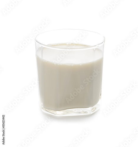 Glass of milk ion white background