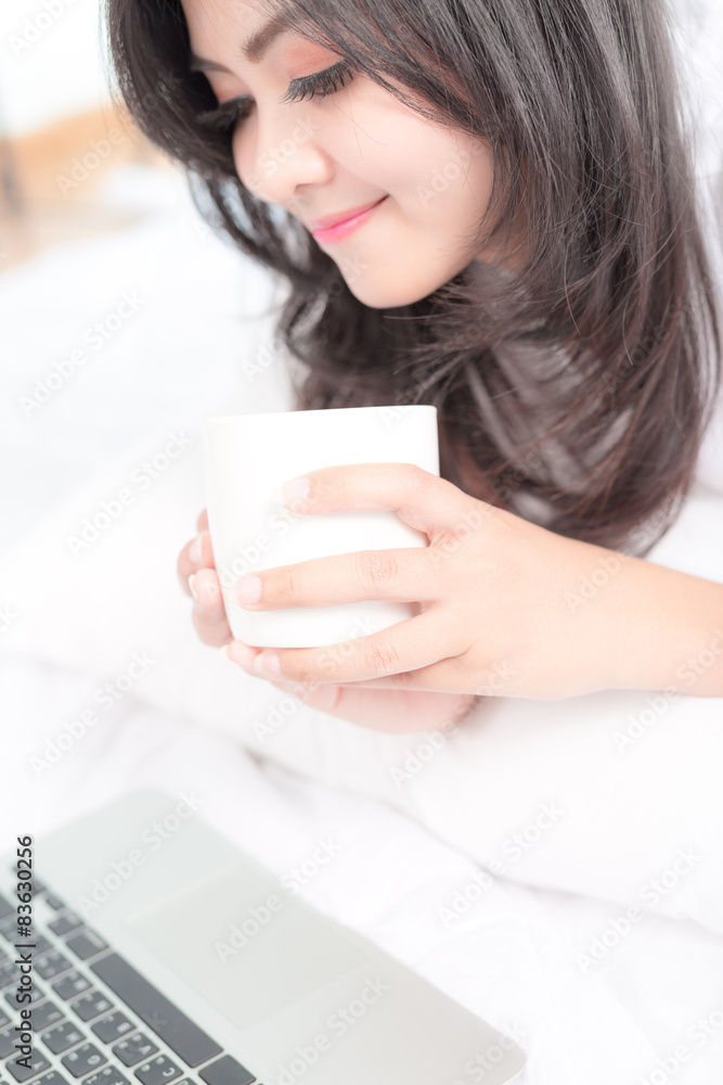 beautiful young woman hold cup of coffee lying think relaxing on beautiful young woman hold cup of coffee lying think relaxing on