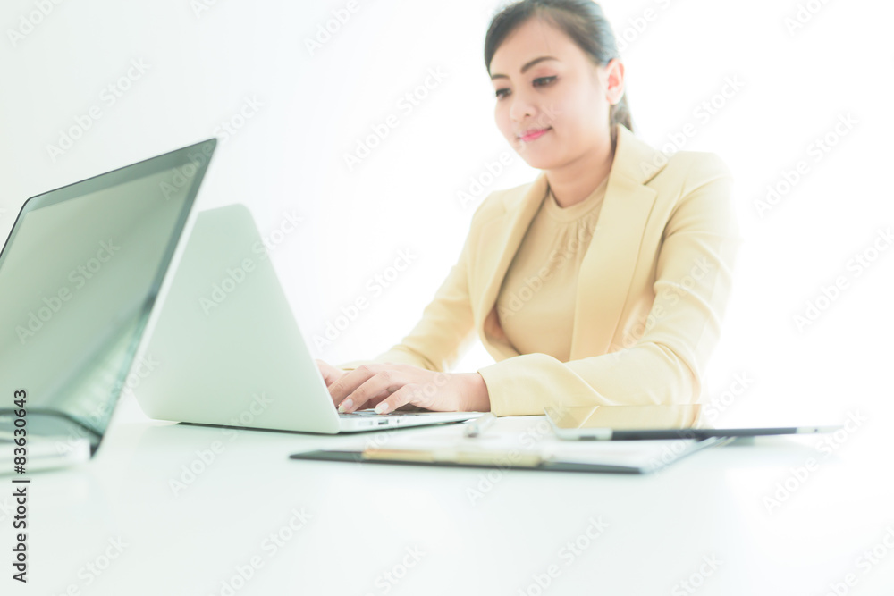 Unrecognizable business person analyzing graphs and taking notes Unrecognizable business person analyzing graphs and taking notes