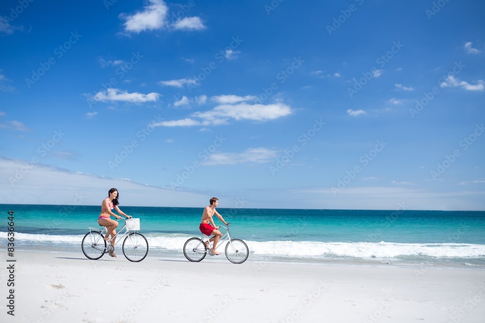 Fototapeta premium Happy couple going on a bike ride