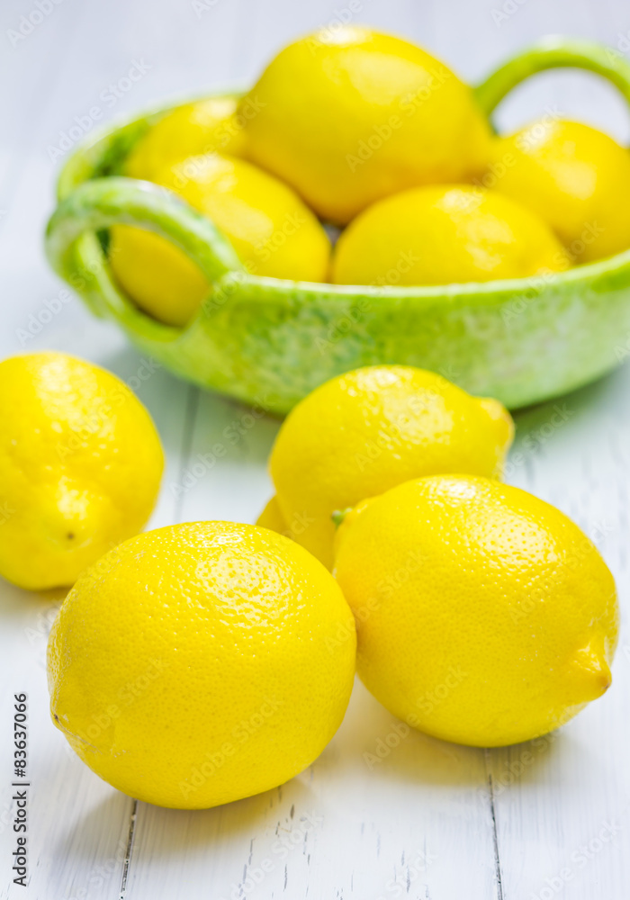 Group of lemons on the wooden table Group of lemons on the wooden table