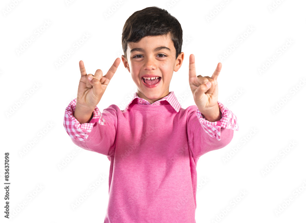Child making horn gesture Child making horn gesture