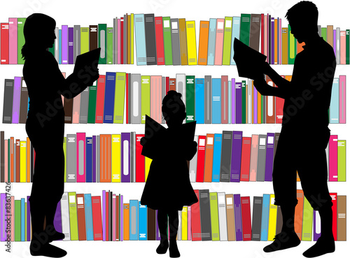 Silhouette of a family reading a book