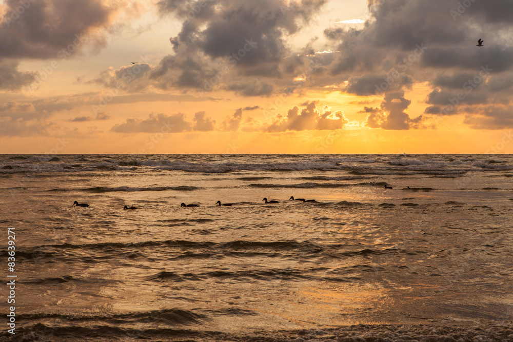 Dramatic sunset with heavy clouds over Baltic.